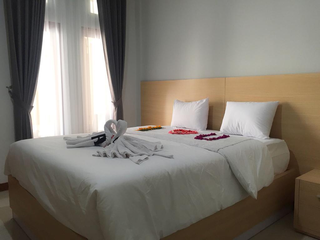 Legian Tom Guest House מראה חיצוני תמונה