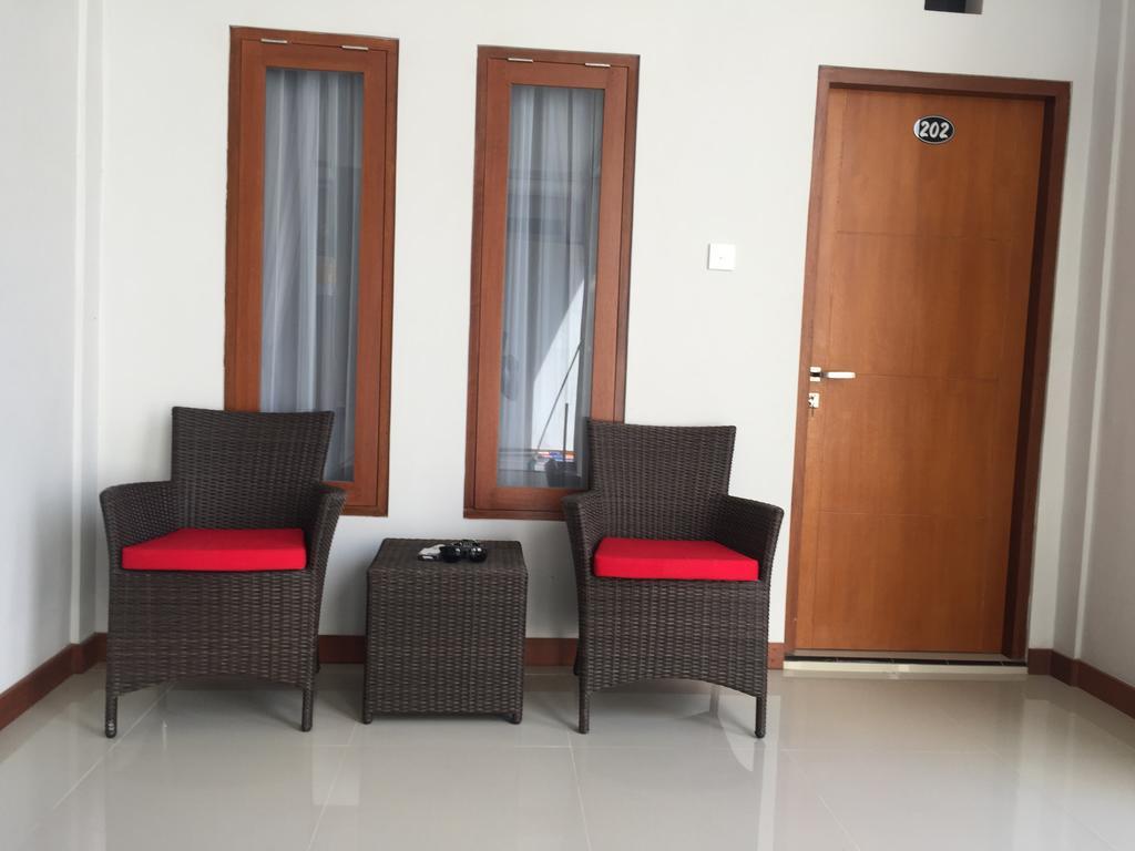Legian Tom Guest House מראה חיצוני תמונה