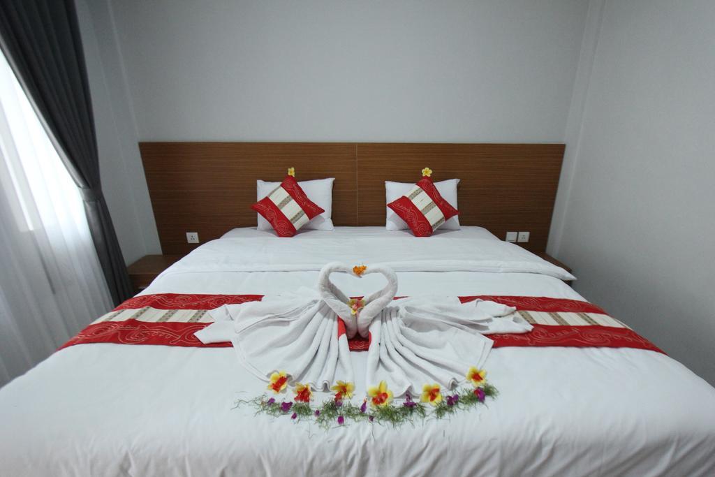 Legian Tom Guest House מראה חיצוני תמונה