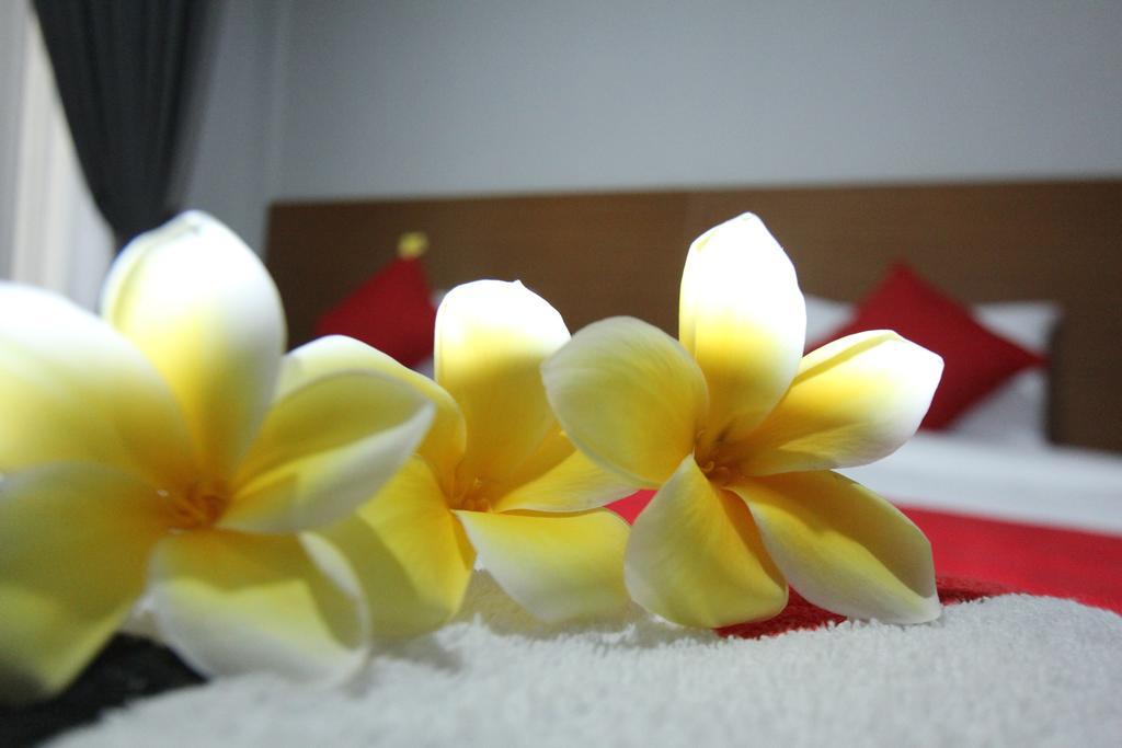 Legian Tom Guest House מראה חיצוני תמונה
