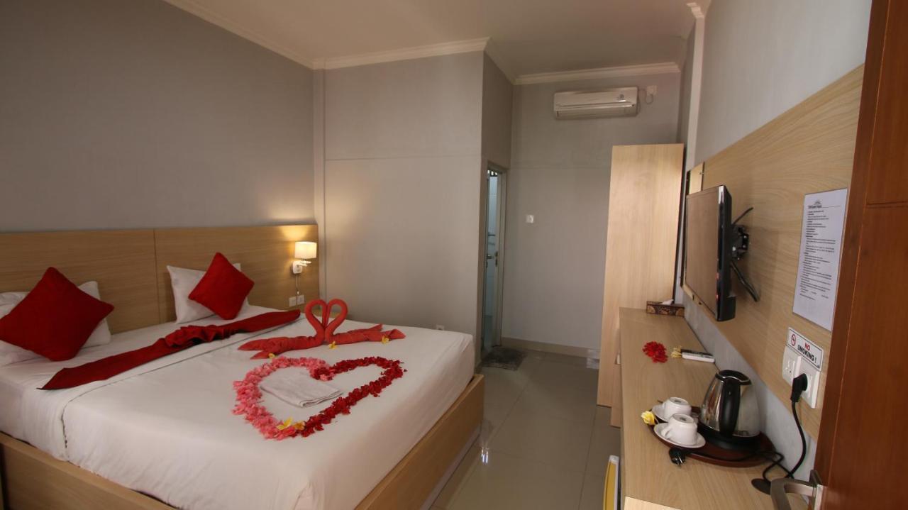 Legian Tom Guest House מראה חיצוני תמונה