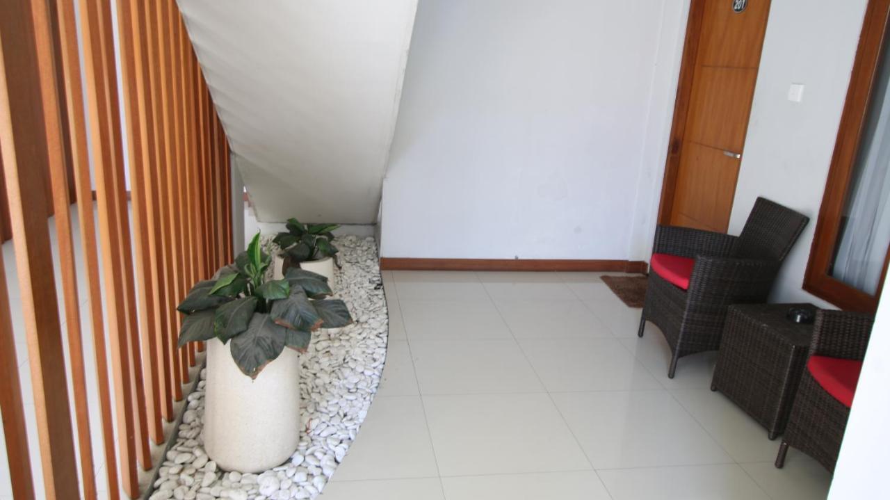 Legian Tom Guest House מראה חיצוני תמונה